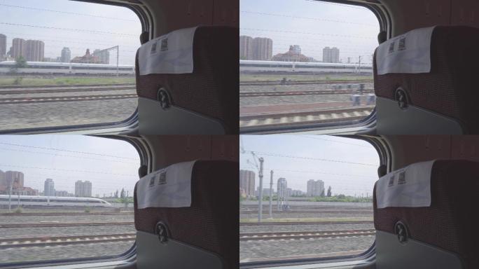 4K火车出站行驶窗外动车