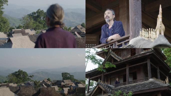 老者登阁楼看村子风景