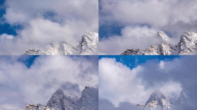 雪山从在云层中若隐若现延时摄影