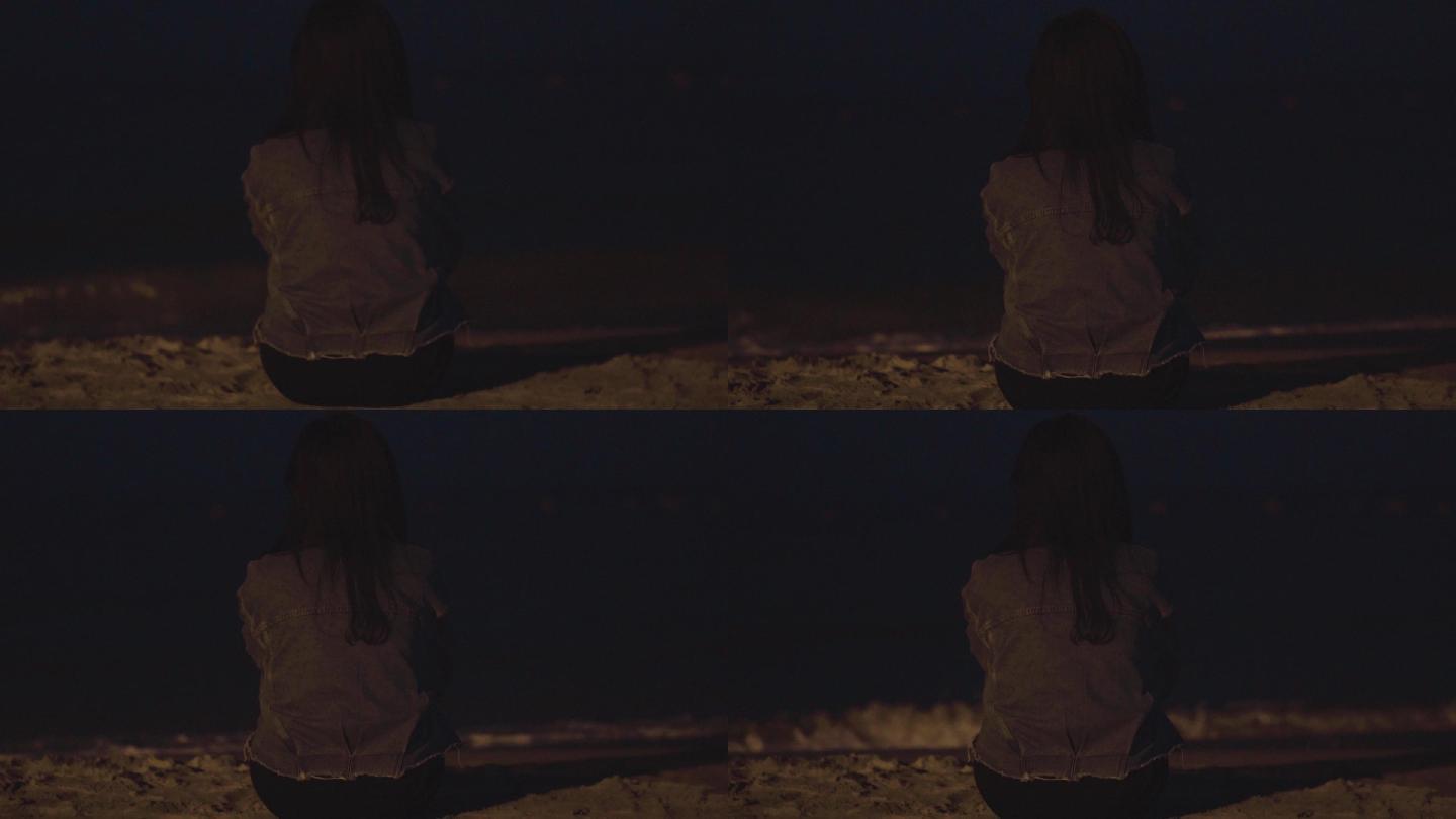海边夜晚女孩看风景