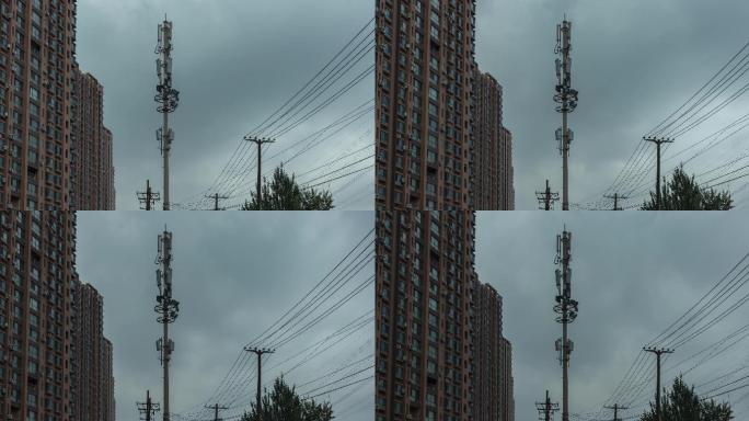 阴雨中的通讯基站塔和楼