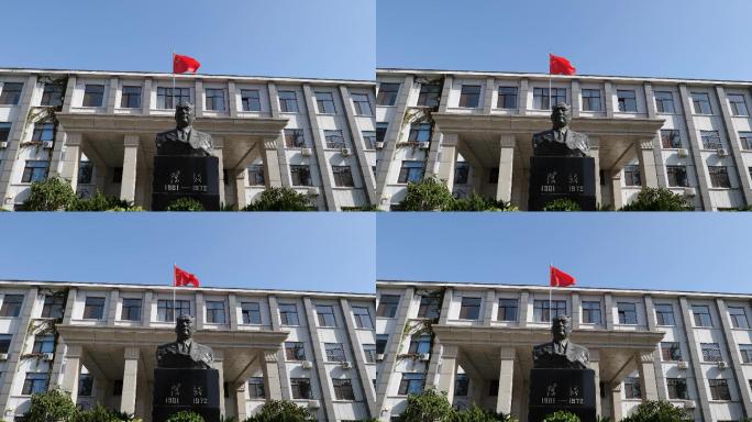 外交学院主楼，外交学院主楼前国旗和雕塑