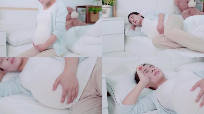 怀孕大肚子孕妇 产前疼痛躺在床上视频素材