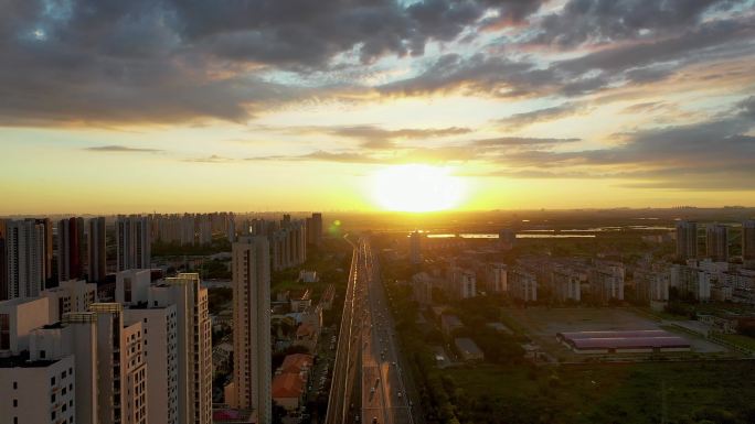 航拍天津滨海新区塘沽津塘公路城市日落