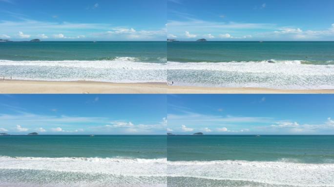 海边海浪拍打沙滩4K航拍