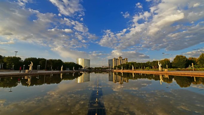 甘肃酒泉市政广场日出霞光延时摄影短视频