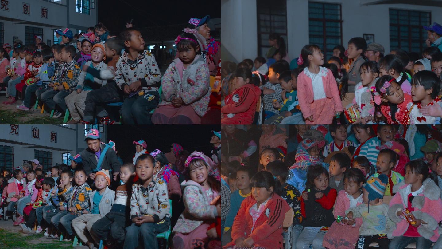 农村儿童视频中国云南农村看露天电影的儿童