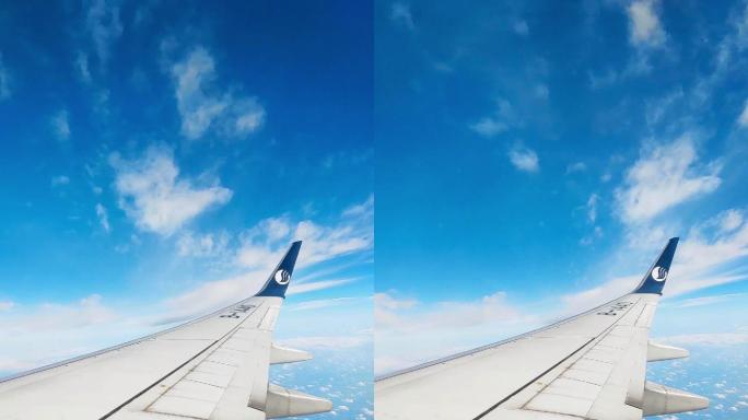 山东航空客机飞机窗外蓝天云海云层竖屏