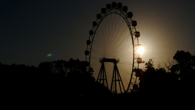 4K原创)夕阳下的摩天轮剪影延时摄影