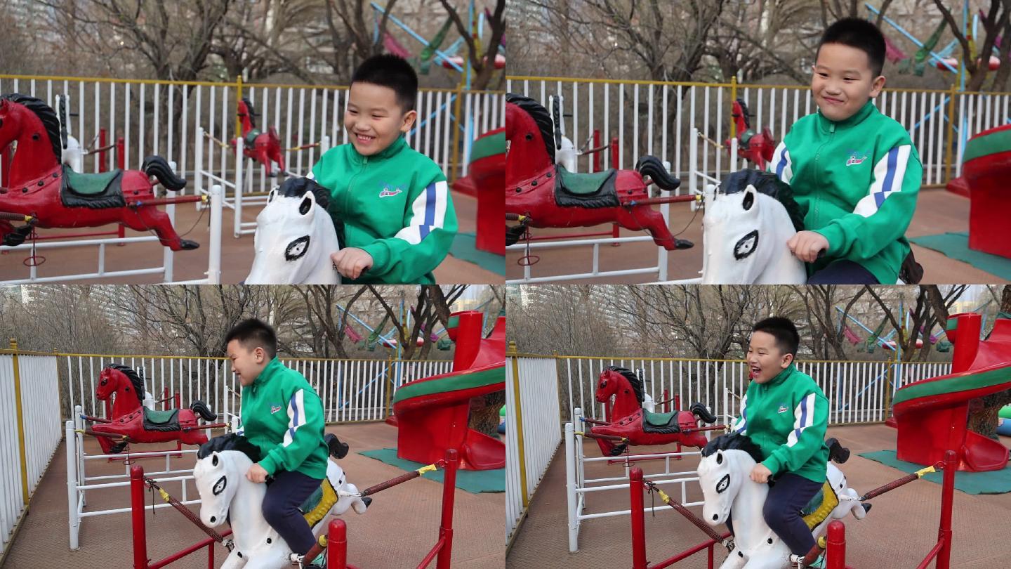 孩子骑玩具马