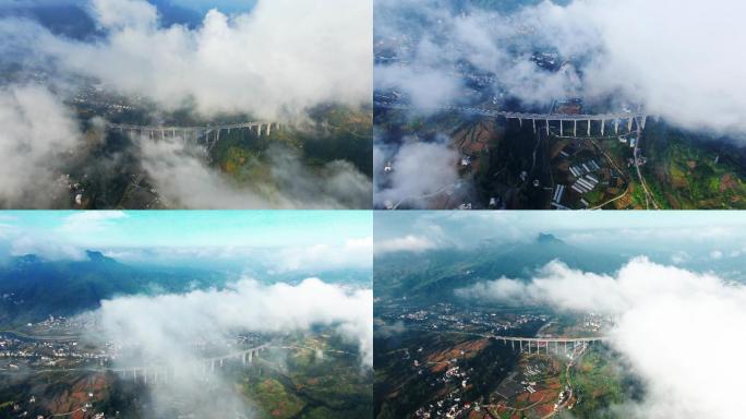 4K  航拍贵州山区云雾下的乡镇高速公路