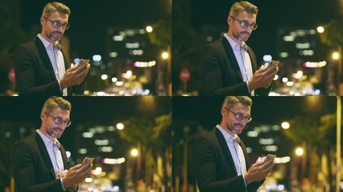 在街头使用手机的男人