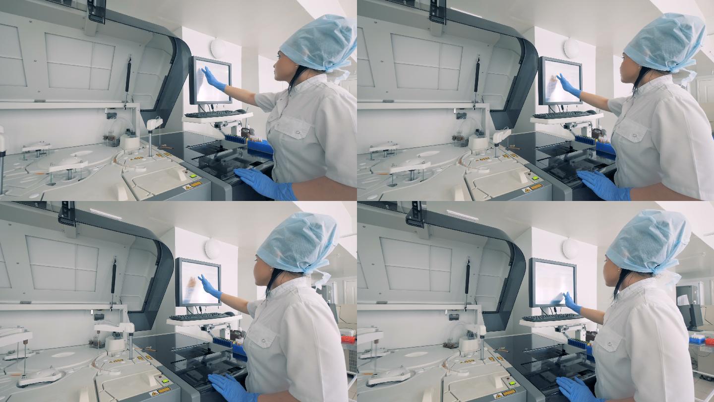 生化分析仪由一家制药厂的实验室工作人员