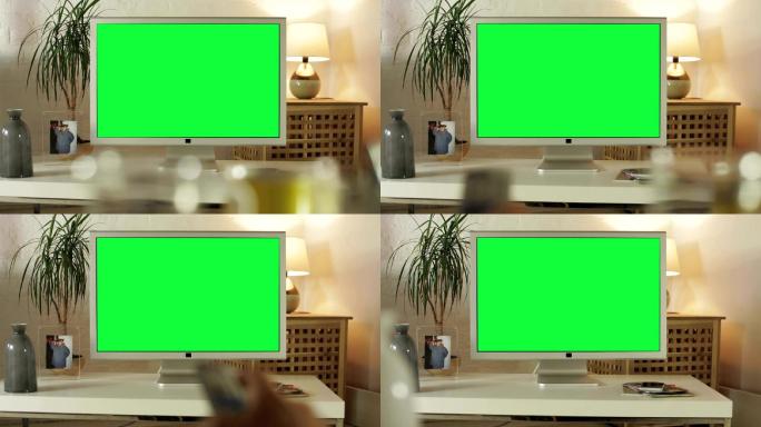 带有绿色屏幕的电视机