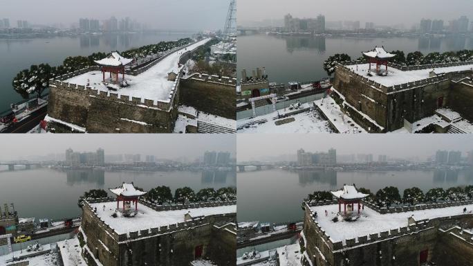 航拍襄阳古城夫人城雪景城市风光