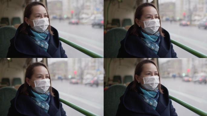巴士上戴防护面罩的女子