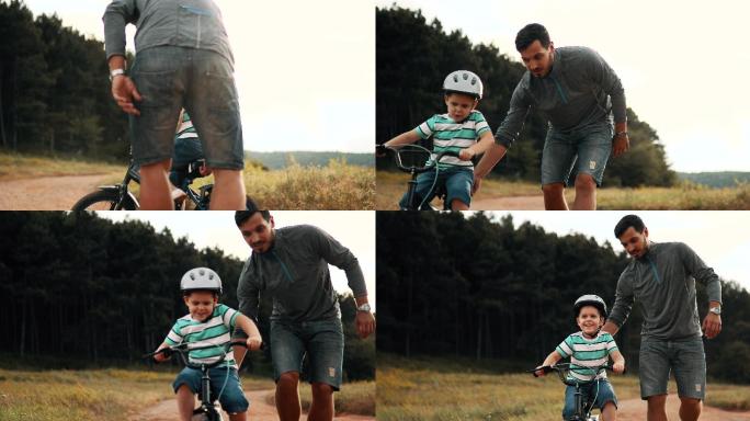 男人正在教他的小儿子骑自行车