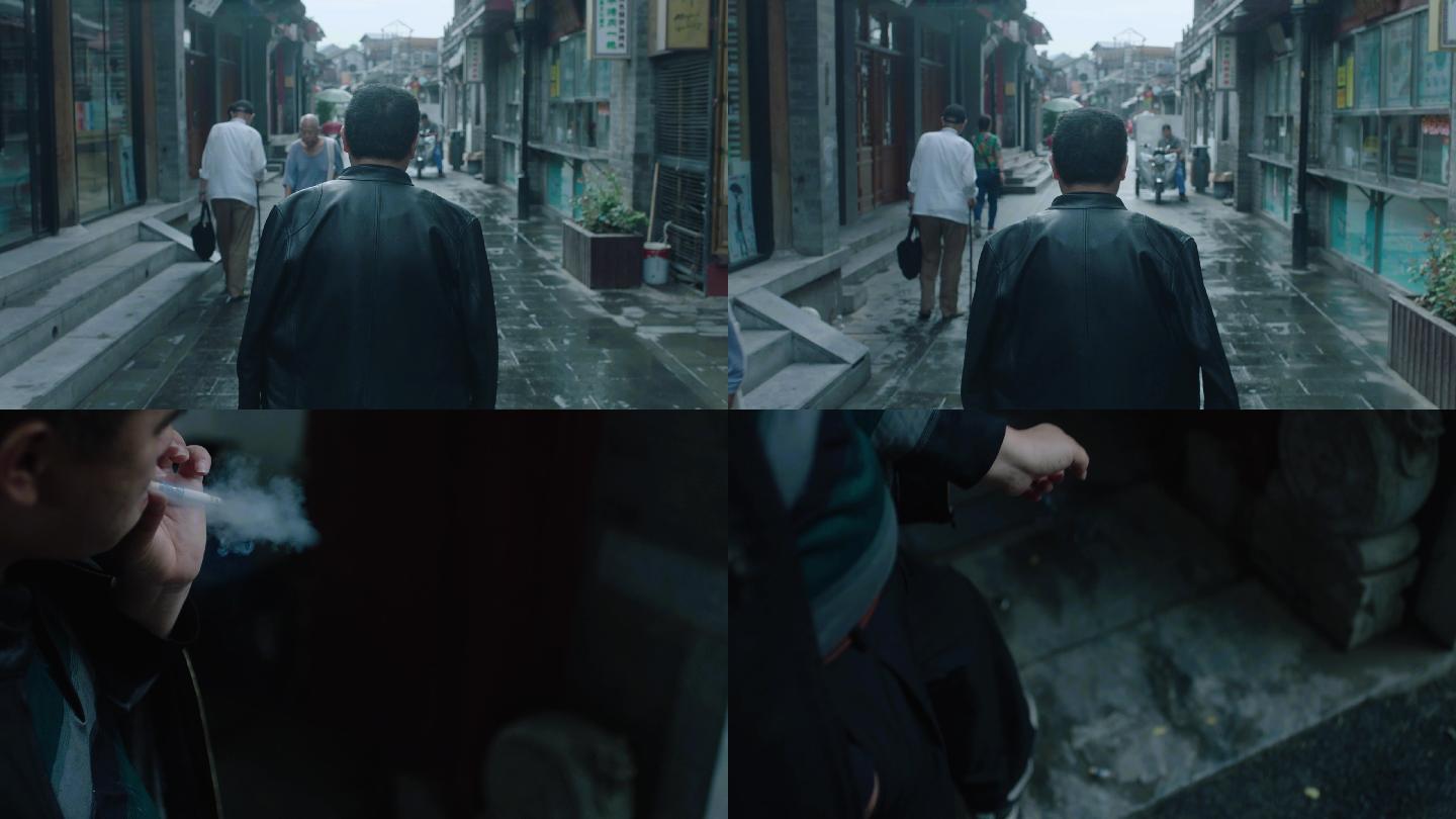北京后海胡同烟袋斜街黑色皮衣男人走路