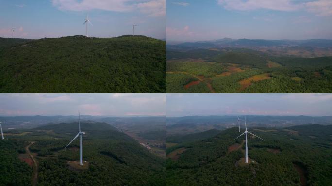 风力发电视频矗立在山颠森林里的发电风车