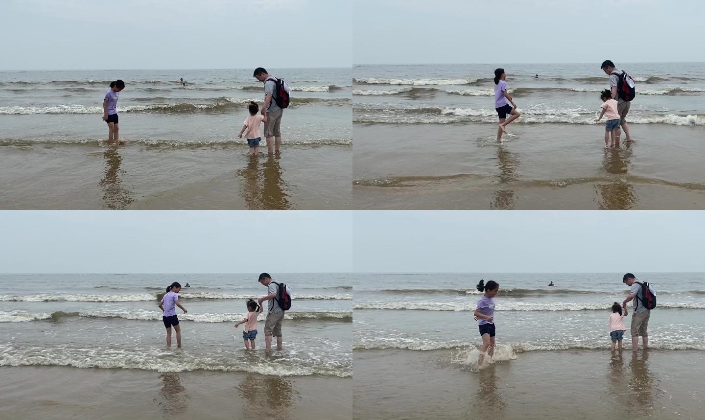 孩子在海边沙滩蹭蹭跳跳出门游玩旅游
