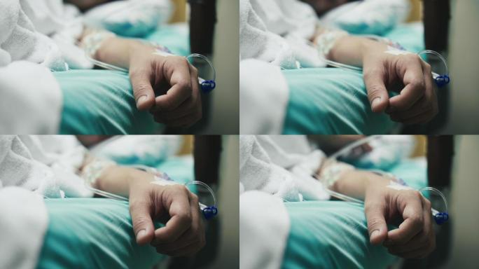 一名怀孕女性患者手部的特写镜头