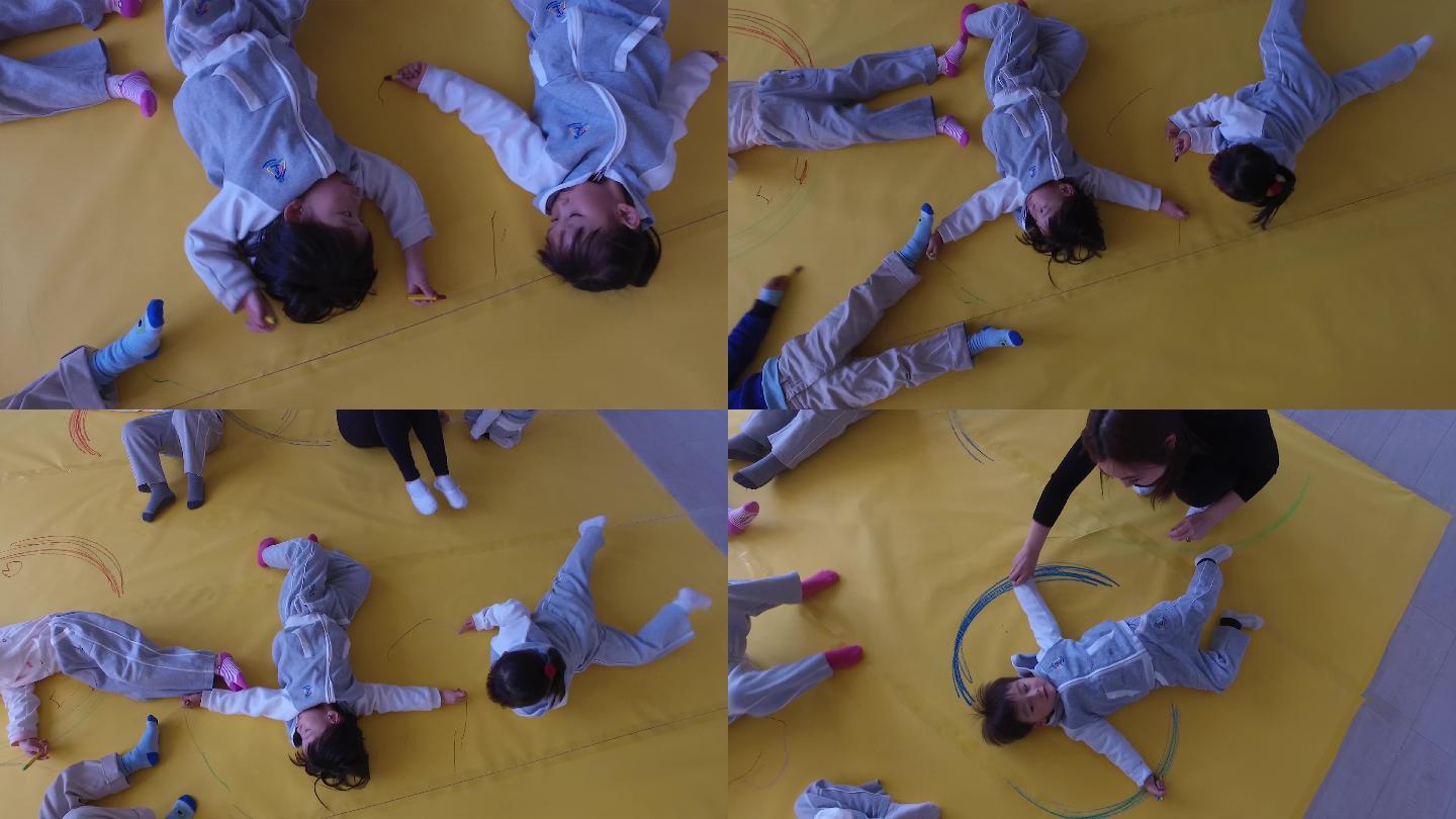 幼儿园孩子躺在地板上玩耍