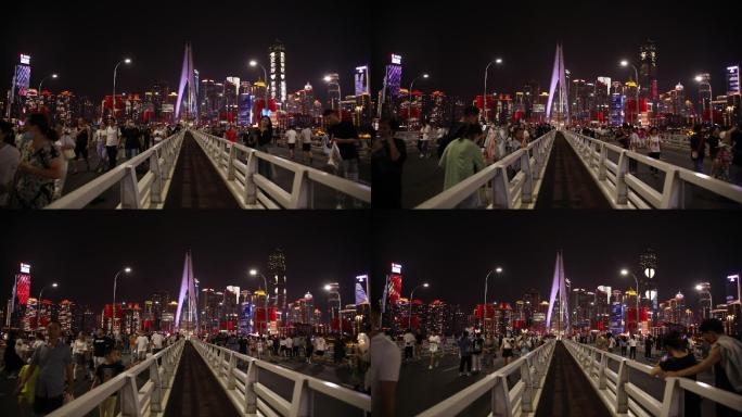 千厮门大桥难的机位延时夜晚人群摄影