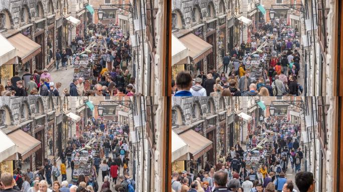 意大利威尼斯里亚尔托桥街上的购物人群