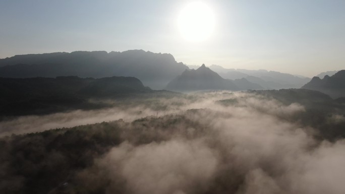 无人机航拍高海拔云雾笼罩的大山