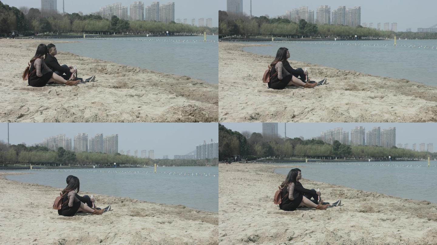 情侣在海边沙滩上约会