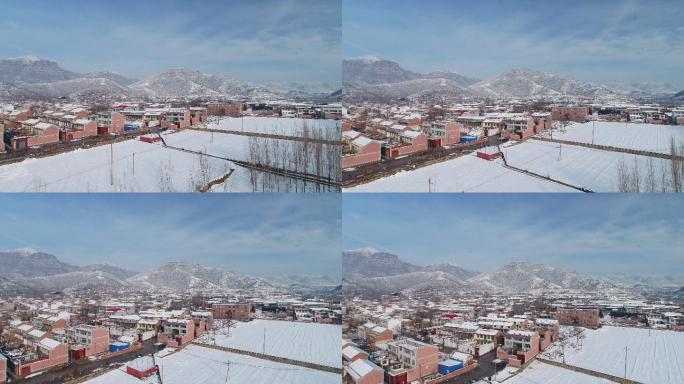 太行山大峡谷雪景航拍村庄推进雪山