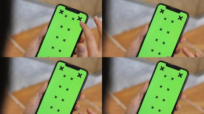 使用绿色屏幕智能手机进行特写