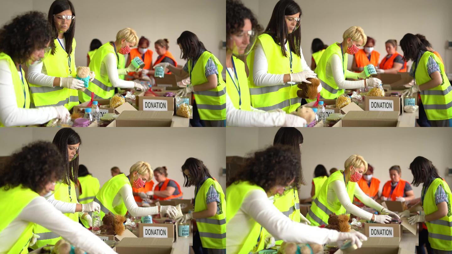 慈善组织在仓库里收集食物捐赠