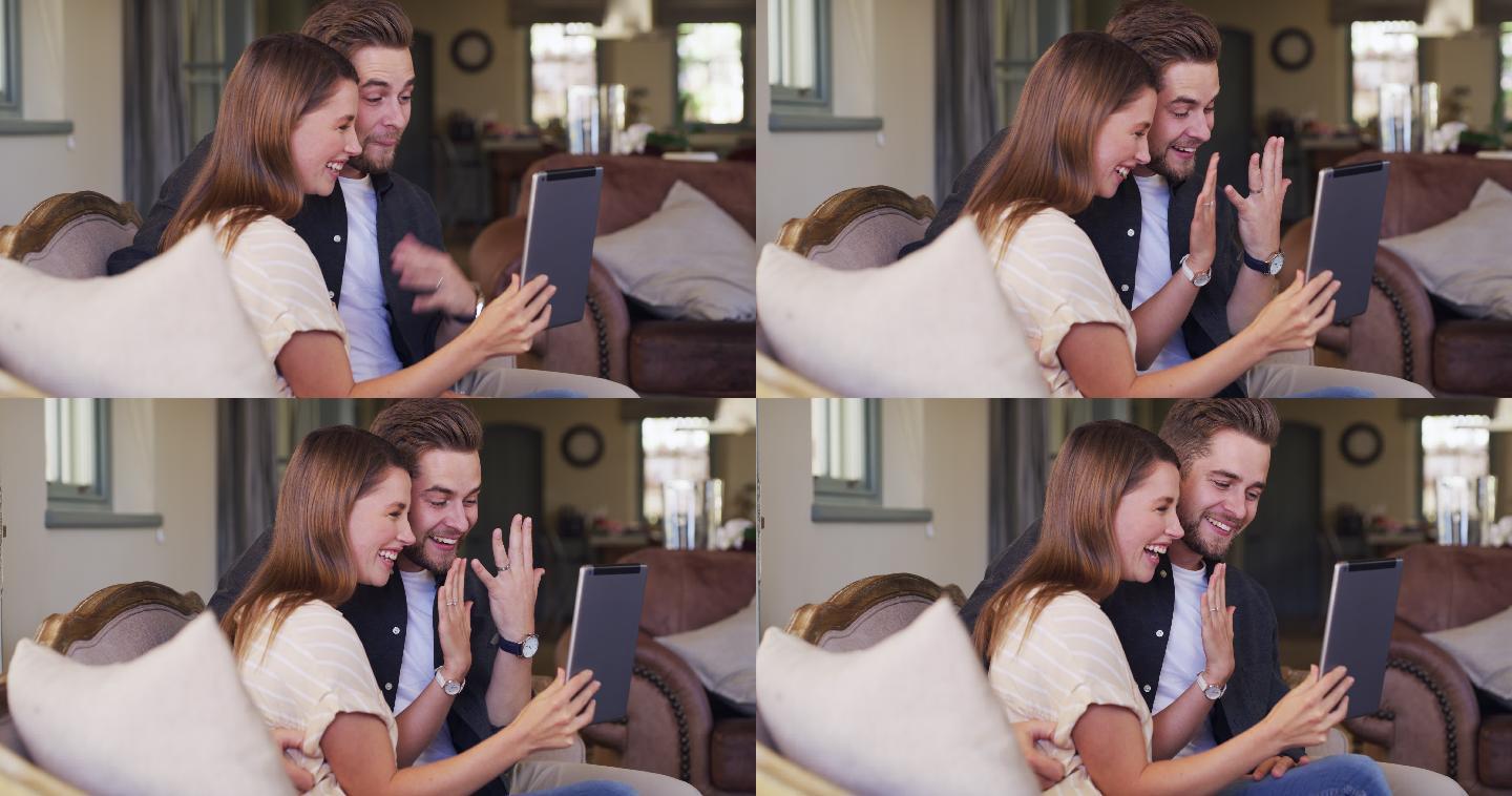 年轻夫妇用平板电脑宣布他们的婚姻