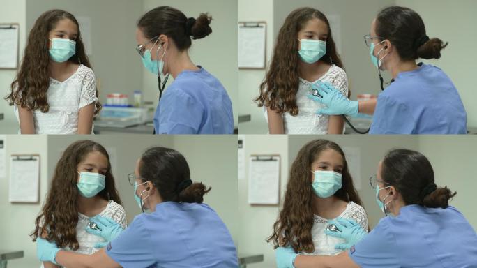 12岁女孩在医生检查时戴着防护面罩