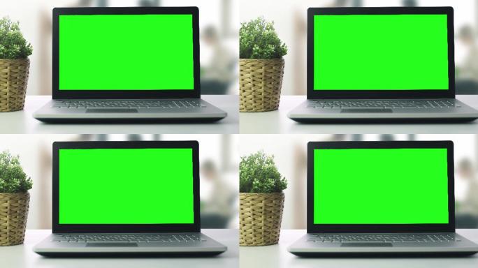 绿色空白屏幕的笔记本电脑