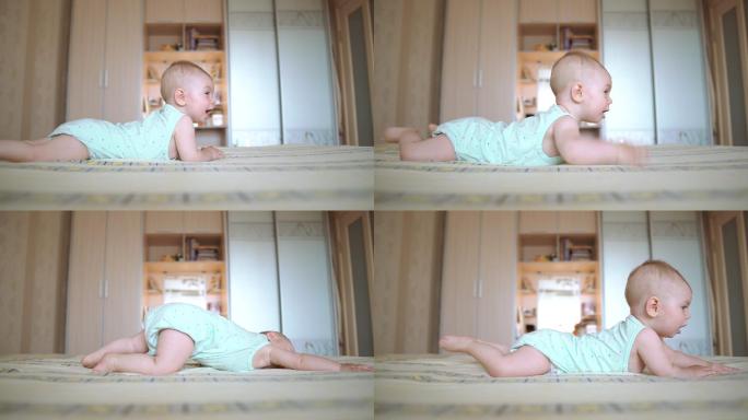 可爱的婴儿爬到床上。