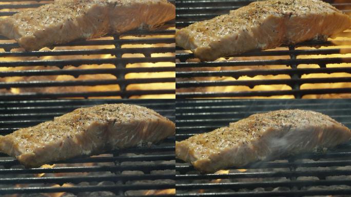 在烤架上烹饪鲑鱼肉