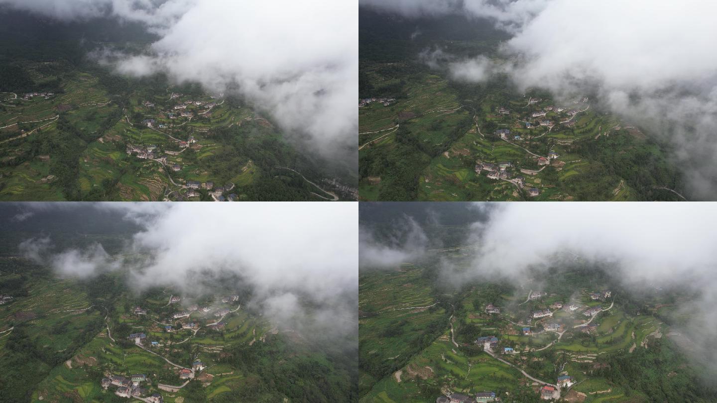 穿梭云层的航拍：云层下的小村庄