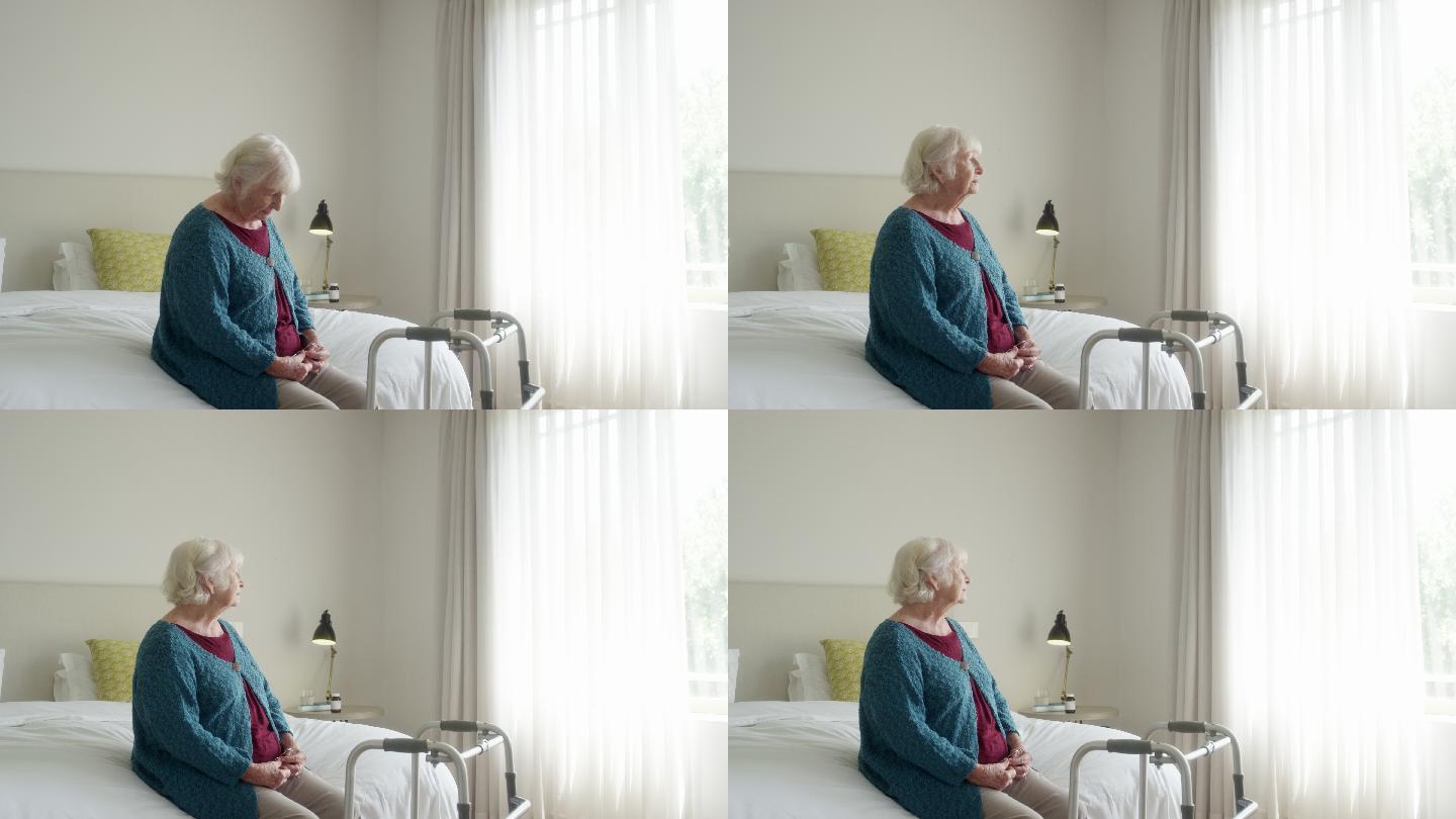 坐在床上的老妇人孤独窗帘老年人