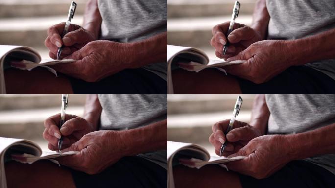 老人布满皱纹的手在写字4k视频素材
