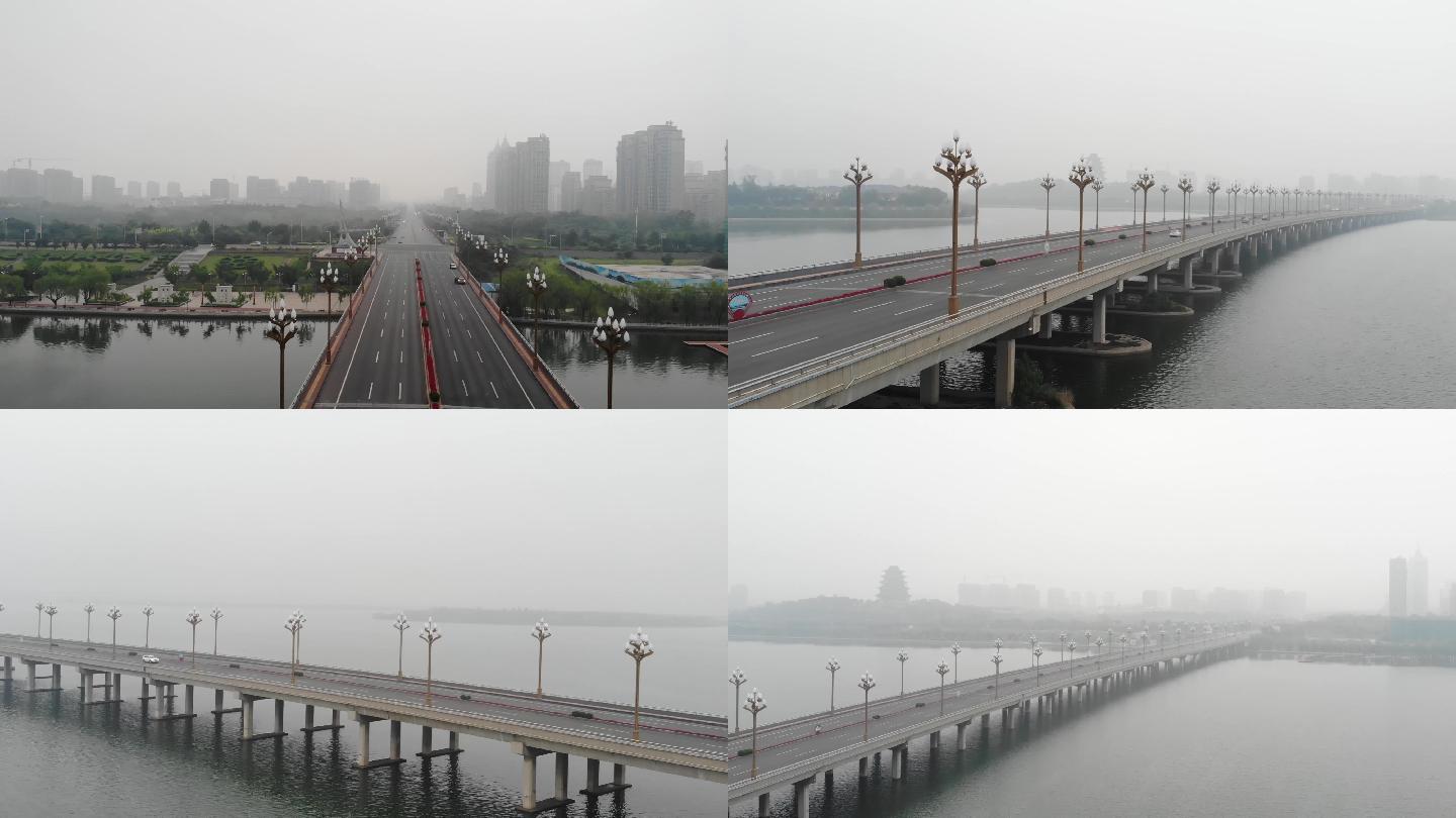 雾中跨河大桥迁安钢城大桥航拍