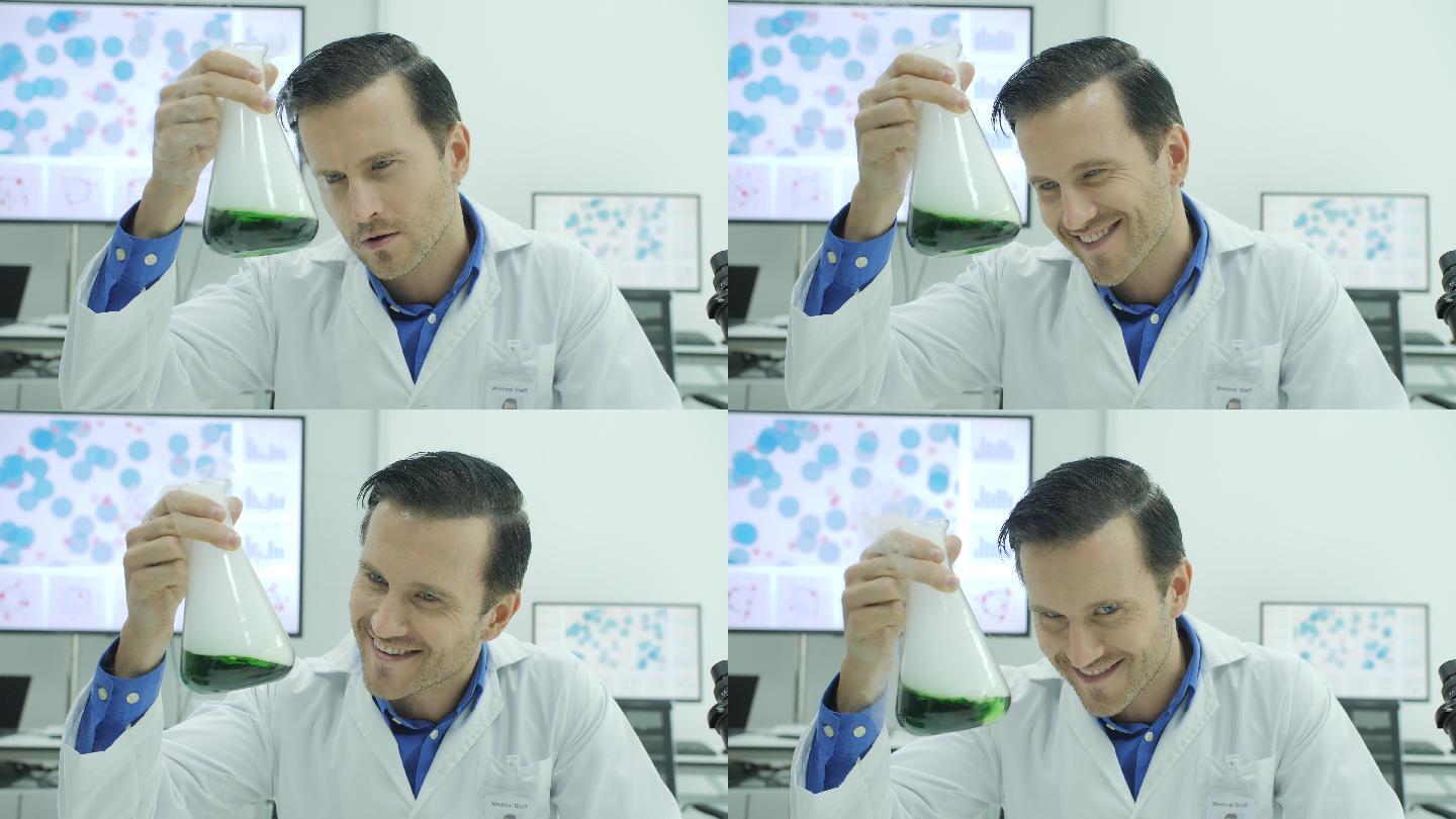 疯狂的科学家在实验室拿着装有绿色液体的容量瓶