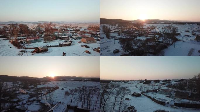 航拍冬季夕阳中的东北农村