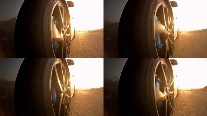 日落时驾车轮胎视角低视角公路马路沥青