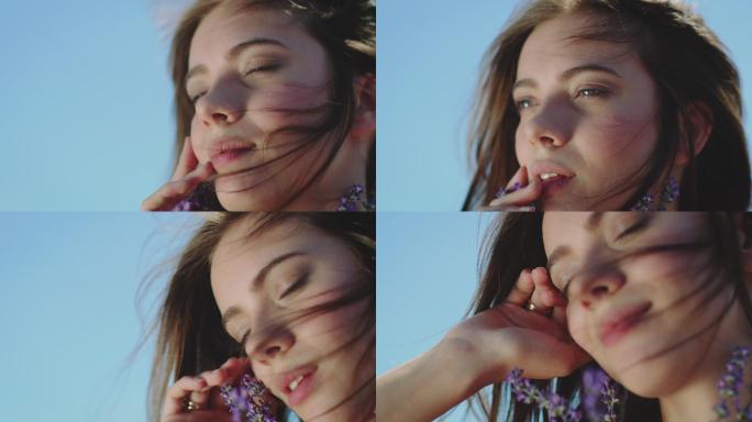 度假时带薰衣草花的年轻女子