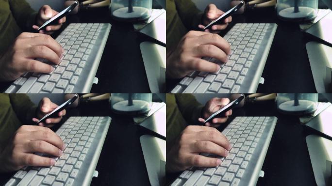黑客使用智能手机和电脑。