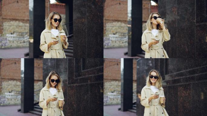 边喝咖啡边使用手机的女人