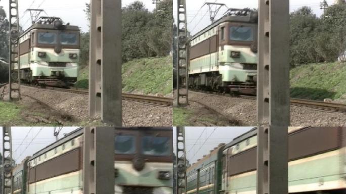 90年代绿皮火车从铁轨驶过