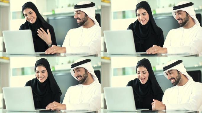 阿拉伯夫妇计划使用笔记本电脑出国度假